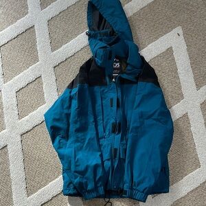 105 Degree Meridi Blue and Black Ski Jacket with Hood and Water-Resistant Fabric